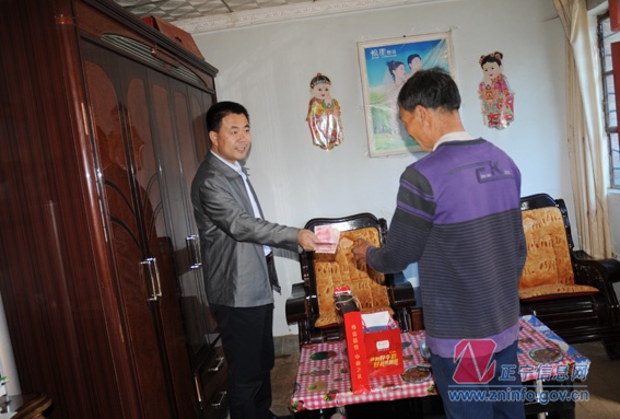 张龙杰走访“双联”户